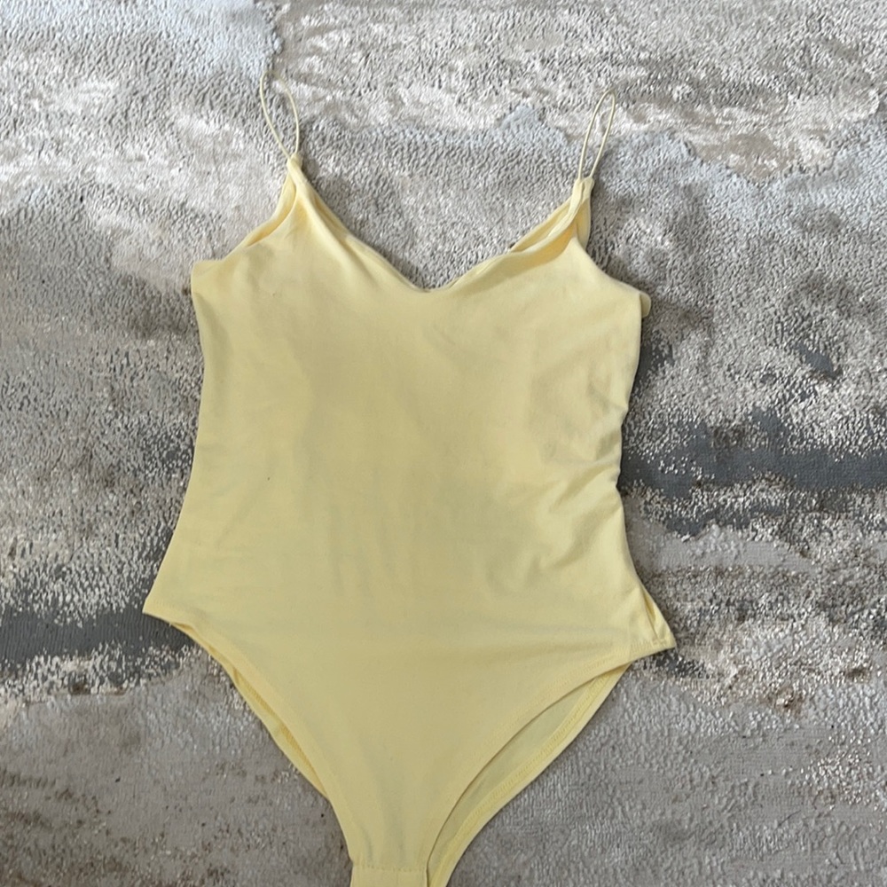 Yellow bodysuit